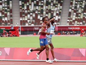 Isaiah Jewett of Team United States and Nijel Amos of Team Botswana compete in the Men's 800m Semi-Final on day nine of the Tokyo 2020 Olympic Games at Olympic Stadium on August 01, 2021 in Tokyo, Japan.