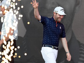 Branden Grace of South Africa acknowledges the crowd as he is introduced as the champion of the LIV Golf Invitational - Portland at Pumpkin Ridge Golf Club on July 2, 2022 in North Plains, Oregon.