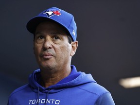 Manager Charlie Montoyo #25 of the Toronto Blue Jays looks on before the game against the Seattle Mariners at T-Mobile Park on July 07, 2022 in Seattle, Washington.