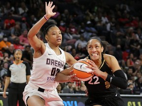 A'ja Wilson #22 of the Las Vegas Aces drives against Naz Hillmon #00 of the Atlanta Dream during their game at Michelob ULTRA Arena on July 19, 2022 in Las Vegas, Nevada.