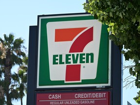 A sign outside a 7-Eleven store in seen in Glendale, California, July 11, 2022.