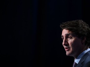Canada's Prime Minister Justin Trudeau addresses media representatives during a press conference at the NATO summit at the Ifema congress centre in Madrid, on June 30, 2022.