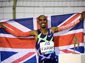 Britain's Mo Farah celebrates after victory and a world record in the men's one hour event at The Diamond League AG Memorial Van Damme athletics meeting at The King Baudouin Stadium in Brussels September 5, 2020.