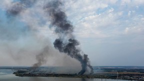 In this aerial view taken with a drone on July 19, 2022, columns of smoke rise from Dartford, Kent, where a fire broke out earlier in the day as part of the aftermath of a major wave of heat affecting Britain.