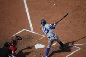 Blue Jays' Raimel Tapia hits an RBI single during the fifth inning against the Boston Red Sox at Fenway Park.  Bob DeChiara/USA TODAY Sports