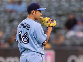 Toronto Blue Jays starting pitcher Yusei Kikuchi (16) reacts during the third inning against the Oakland Athletics at RingCentral Coliseum July 5, 2022.