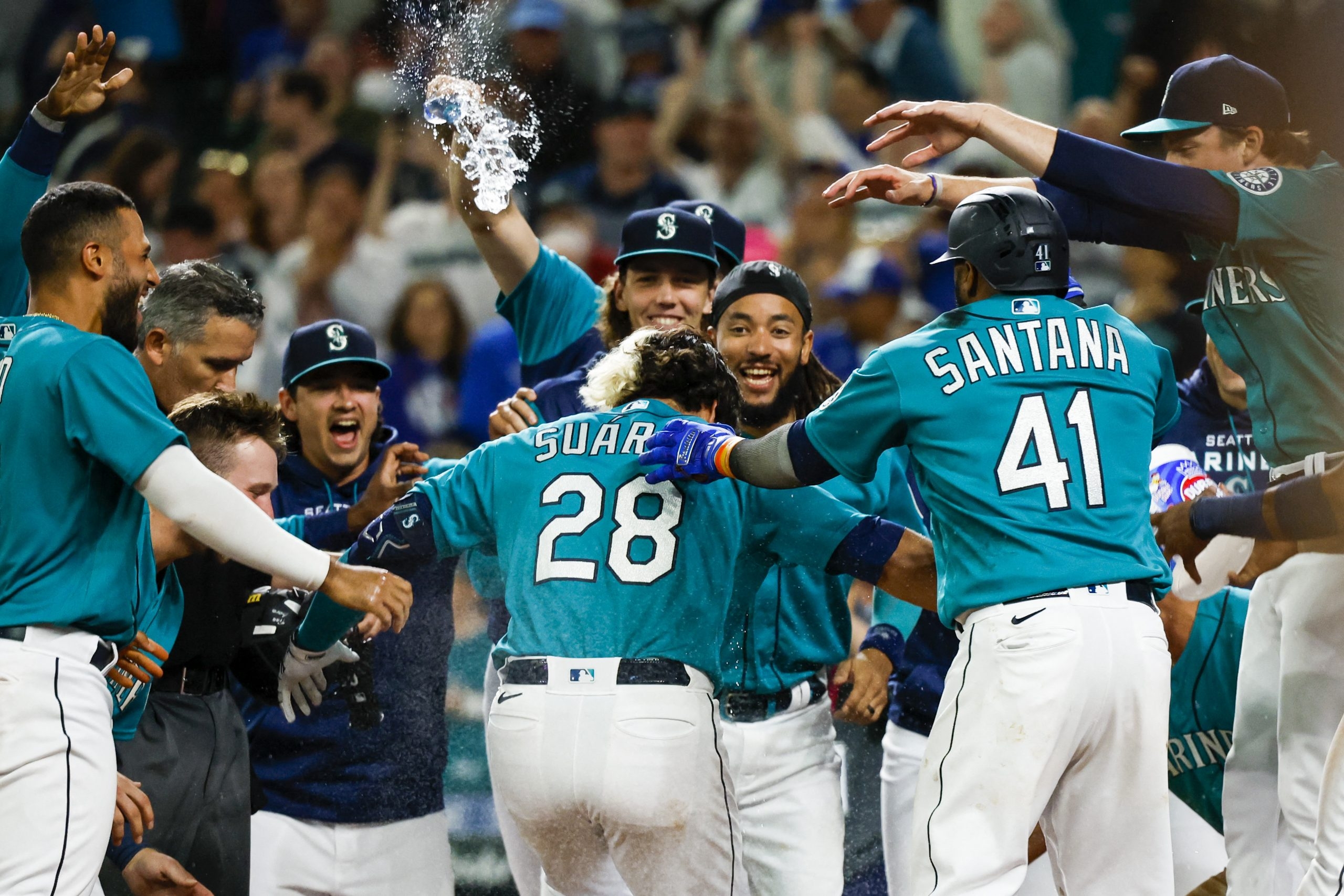 Eugenio Suarez of the Seattle Mariners celebrates his walk-off