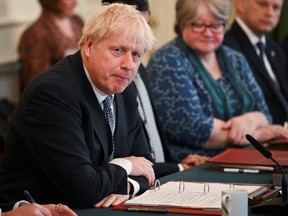 British Prime Minister Boris Johnson addresses his cabinet ahead of the weekly cabinet meeting at Downing Street in London, Tuesday, July 5, 2022.