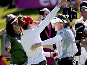 Brooke Henderson of Canada celebrates after winning the The Amundi Evian Championship at Evian Resort Golf Club on July 24, 2022 in Evian-les-Bains, France.