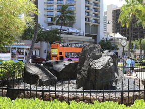 The Kapaemahu stones are displayed at Waikiki beach in Honolulu.
