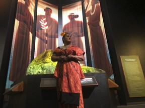 Hinaleimoana Wong-Kalu, one of the curators of the new Kapaemahu exhibit at Bishop Museum in Honolulu. (AP Photo/Audrey McAvoy)