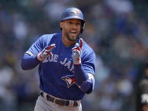 Toronto Blue Jays' George Springer got another night off on Friday in Boston to rest his sore elbow.