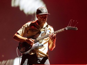 Tom Morello of Rage Against the Machine performs on Saturday, July 16, 2022, in Quebec City.