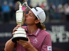 Australia's Cameron Smith kisses the Claret Jug after winning the 150th British Open at St Andrews in Scotland.