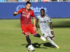 Toronto FC defender Carlos Salcedo (3) moves the ball against CF Montreal midfielder Jojea Kwizera (17) during the first half at BMO Field.