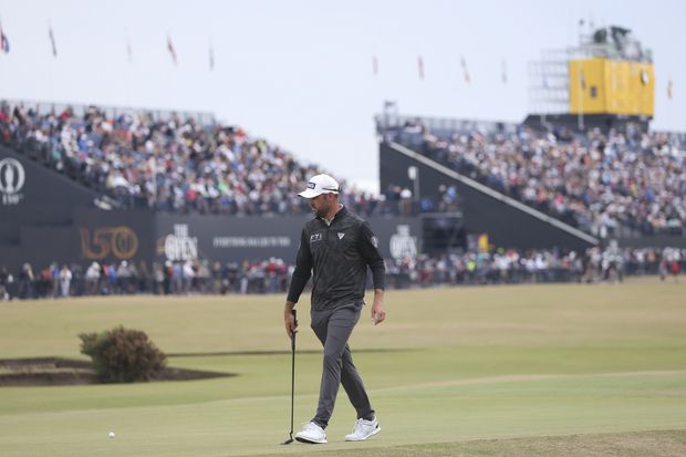 Canadian Corey Conners prepares to putt on the 17th green during the final round of the British Open on Sunday at St Andrews, Scotland.
