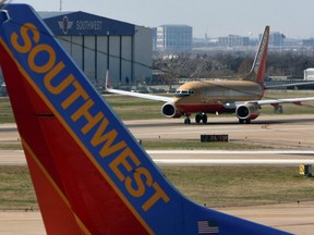 Southwest Airlines planes take off from the airline's hub at Dallas Love Field Airport, in Dallas, Texas, March 12, 2008.