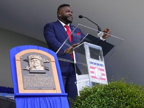 Hall of Fame inductee David Ortiz delivers his acceptance speech during the Baseball Hall of Fame induction ceremony at the Clark Sports Center.