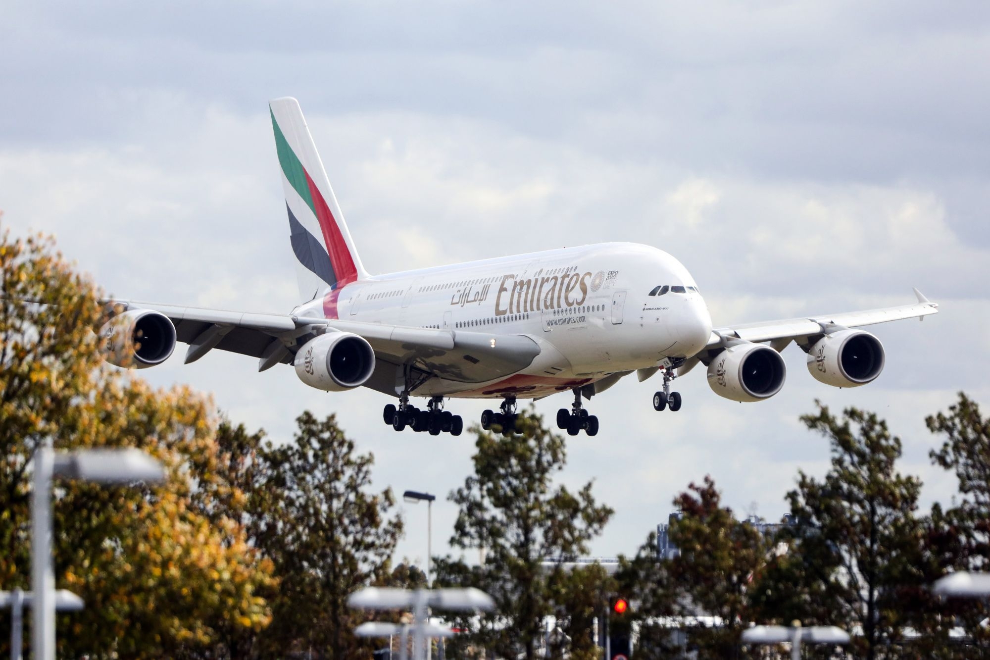 Woman with expired passport and late for Emirates flight flips out