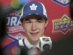 Fraser Minten gives an interview after being selected by the Toronto Maple Leafs in the second round of the NHL draft at the Bell Centre.