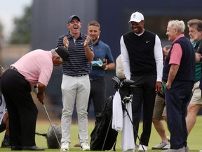 Team Woods' Lee Trevino of the U.S. in action during the Celebration of Champions four hole tournament as Team Woods' Tiger Woods of the U.S., Northern Ireland's Rory McIlroy of Team Woods and former golfer Jack Nicklaus.