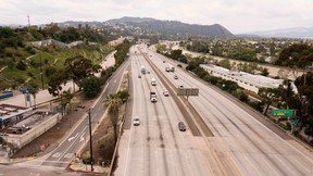 The northbound 5 freeway is mostly empty midday during the coronavirus COVID-19 pandemic in Los Angeles, California on April 13, 2020. (Photo by ROBYN BECK/AFP via Getty Images)