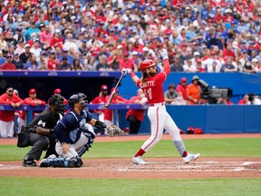 Bo Bichette #11 of the Toronto Blue Jays hits a two RBI double against the Tampa Bay Rays in the third inning during their MLB game at the Rogers Centre on July 1, 2022 in Toronto, Ontario, Canada. (Photo by Mark Blinch/Getty Images)