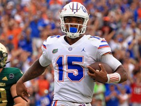 Anthony Richardson #15 of the Florida Gators rushes for a fourth quarter touchdown during a game against the South Florida Bulls at Raymond James Stadium on September 11, 2021 in Tampa, Florida.