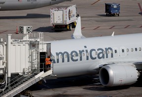 An American Airlines plane parked at its gate in the Miami International Airport on Dec. 10, 2021 in Miami, Florida.