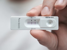 A positive antigen test for COVID-19.