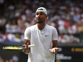 Nick Kyrgios of Australia reacts against Novak Djokovic of Serbia during their Men's Singles Final match on day fourteen of The Championships Wimbledon 2022 at All England Lawn Tennis and Croquet Club on July 10, 2022 in London, England. (Photo by Julian Finney/Getty Images)