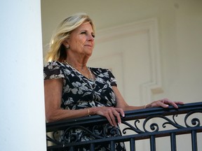 First Lady Jill Biden watches as Marine One lands on the South Lawn of the White House in Washington, DC on June 30, 2022.