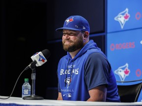 John Schneider speaks during a news conference after being named Toronto Blue Jays interim manager  on Wednesday at the Rogers Centre.