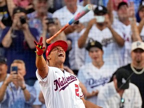 Washington Nationals right fielder Juan Soto celebrates after winning the 2022 Home Run Derby at Dodgers Stadium.