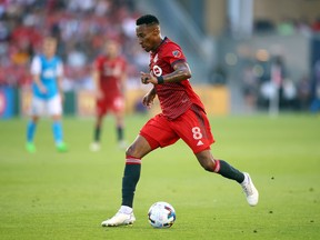 Mark-Anthony Kaye dribbles the ball against Charlotte FC at BMO Field on July 23, 2022.  Kaye picked up two assists in his first home game for Toronto FC.