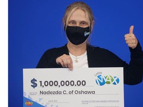 Nadezda Calderone with her giant cheque.
