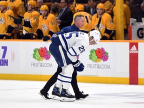 Maple Leafs winger Ondrej Kase is helped off the ice in March. Unofficially, the sixth of his career cost him more than a month at the end of the regular season.