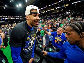 Otto Porter Jr.  celebrates after the Golden State Warriors beat the Boston Celtics to win this season's NBA championship. Porter Jr. is a new addition to the Raptors.