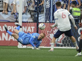 Vancouver Whitecaps FC goaltender Cody Cropper (55) blocks a shot on net by the Toronto FC during the second half at BC Place on Tuesday night.