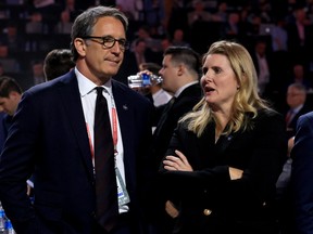 Maple Leafs president Brendan Shanahan (left) and assistant general manager Hayley Wickenheiser talk prior to Round 1 of the 2022 NHL Draft at the Bell Centre on July 7  in Montreal.