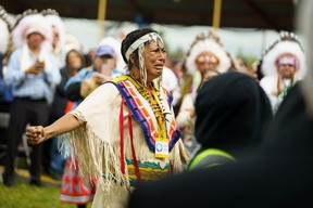 Si Pih Ko, also known by her English name as Trina Francois, sings in the Cree language during a visit by Pope Francis, who apologized to Canada’s native people on their land for the Church’s role in schools where Indigenous children were abused, in Maskwacis, Alta., July 25, 2022.