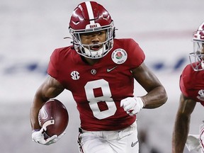 Wide receiver John Metchie III was a member of the Alabama Crimson Tide before turning pro.