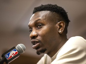 Chris Boucher, who has re-signed with the Toronto Raptors, addresses media at the OVO Athletic Centre in Toronto, Ont. on July 7, 2022.
