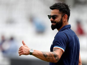 India's Virat Kohli gestures ahead of the Royal London x ACE One Day International (ODI) cricket match between England and India at The Oval in London on July 12, 2022.