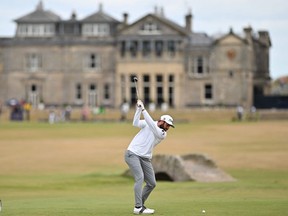 US golfer Cameron Young plays from the 18th tee during his opening round 64 on the first day of The 150th British Open Golf Championship on The Old Course at St Andrews in Scotland on July 14, 2022. -