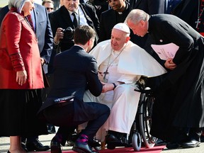 Prime Minister Justin Trudeau greets Pope Francis as he arrives at the Citadelle in Quebec City on July 27, 2022.
