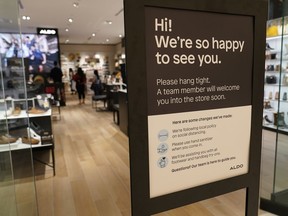 A sign is posted at the entrance of an Aldo shoe store inside the American Dream Mall, Thursday, Oct. 1, 2020, in East Rutherford, New Jersey.