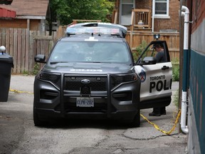 Toronto Police spent Friday, July 8, 2022, investigating the "suspicious" death of a person, believed to be a woman, found Thursday night in an alley near Woodbine Ave. and Gerrard St. E.