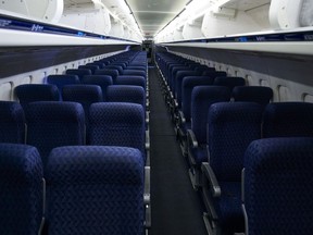 Passenger seats are seen in the economy class cabin of an American Airlines MD-80 aircraft at Dallas/Fort Worth International Airport (DFW) near Dallas, Texas, on Sunday, Sept. 1, 2019.