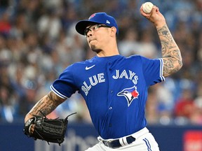 Jul 27, 2022; Toronto, Ontario, CAN;  Toronto Blue Jays relief pitcher Anthony Banda (43) delivers a pitch against the St. Louis Cardinals in the eighth inning at Rogers Centre.
